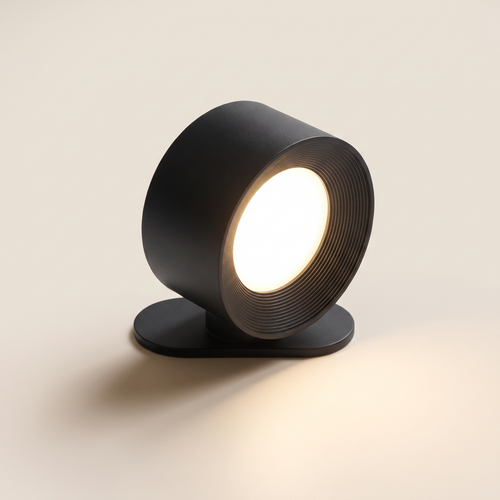 Cordless wall lamp seen from the front with its magnetic base