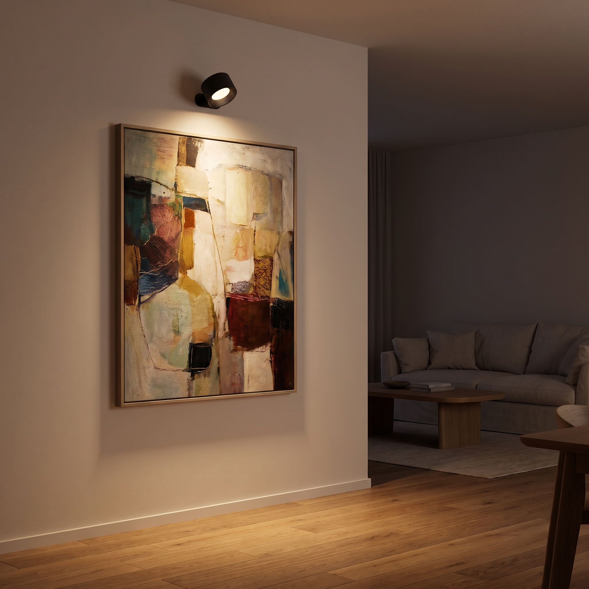 Wall lamp used as a picture light above a framed artwork